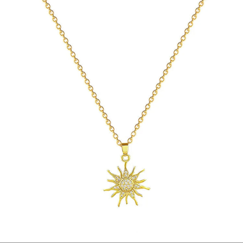 Collar dorado con sol en puntas