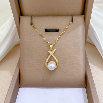 Conjunto nudo cruzado de piedras con perla