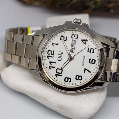 Reloj Q&Q Analogo A05A-002PY Hombre - Reloj Reloj Q&Q original | Compra en Relojchile Chile | Reloj Q&Q Chile | Reloj Reloj Chile - Reloj hombre chile - Reloj mujer chile - Reloj santiago - Reloj original chile - reloj elegante hombre - reloj casual mujer - reloj resistente al agua - reloj acero inoxidable - reloj deportivo hombre - tienda de relojes online chile