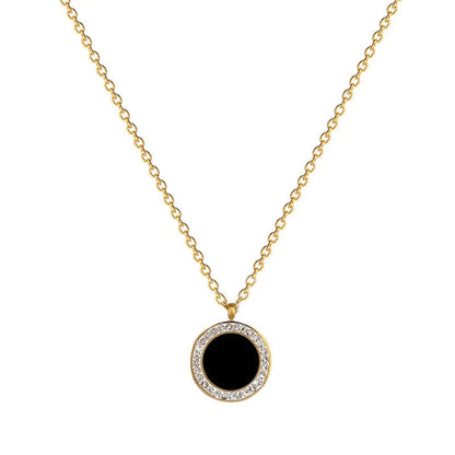 Collar dorado con piedra negra borde blancas
